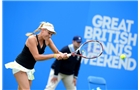 BIRMINGHAM, ENGLAND - JUNE 09:  Donna Vekic of Croatia returns a shot from Belinda Bencic of Switzerland on day one of the AEGON Classic Tennis Tournament at Edgbaston Priory Club on June 9, 2014 in Birmingham, England.  (Photo by Tom Dulat/Getty Images)